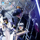 O jogador de tiro para múltiplos jogadores VR do zombi 4-5 do equipamento do parque de diversões de VR ajustou a máquina da realidade 9D virtual